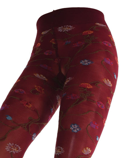 Dark red coloured tights with a colourful floral patterned (close up of waist band & gusset) on a white background