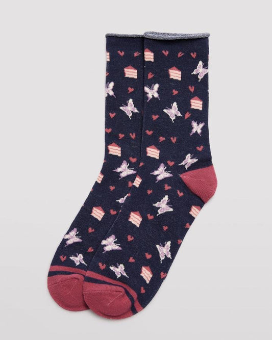 Ysabel Mora 12212 Butterfly & Cake Socks - Navy crew length cotton ankle socks with an all over pattern of butterflies, slices of cake and hearts, with a soft roll top edge, dark pink flat toe seam and shaped heel.