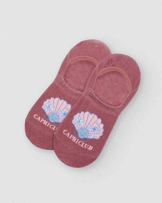 Ysabel Mora Capriclub Shoe Liners - Dirty pink no show shoe liner socks with a clam shell motif with sunset and palm trees & in pale pink and light blue, "CAPRICLUB" written underneath and three strips of silicone on the heel.