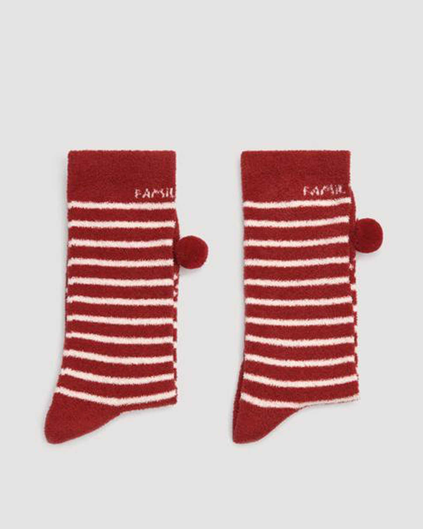 Ysabel Mora 12809 Rudolf Slipper Socks - Dark red fluffy flannel slipper socks gift box with a white stripe pattern, Rudolf at the toe with a red pom pom nose and the text 'Family Time' on the cuff. 