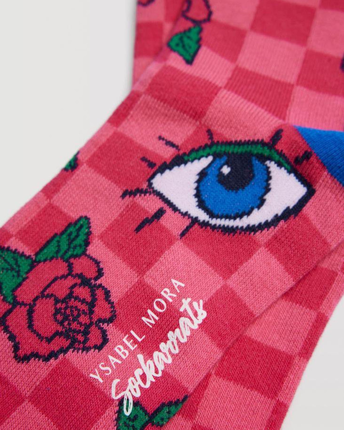Ysabel Mora 12906 Sockarrats Checkered Rose Socks - Two toned chess board pattern pink cotton crew length ankle socks with a rose and eyes pattern, blue heel.