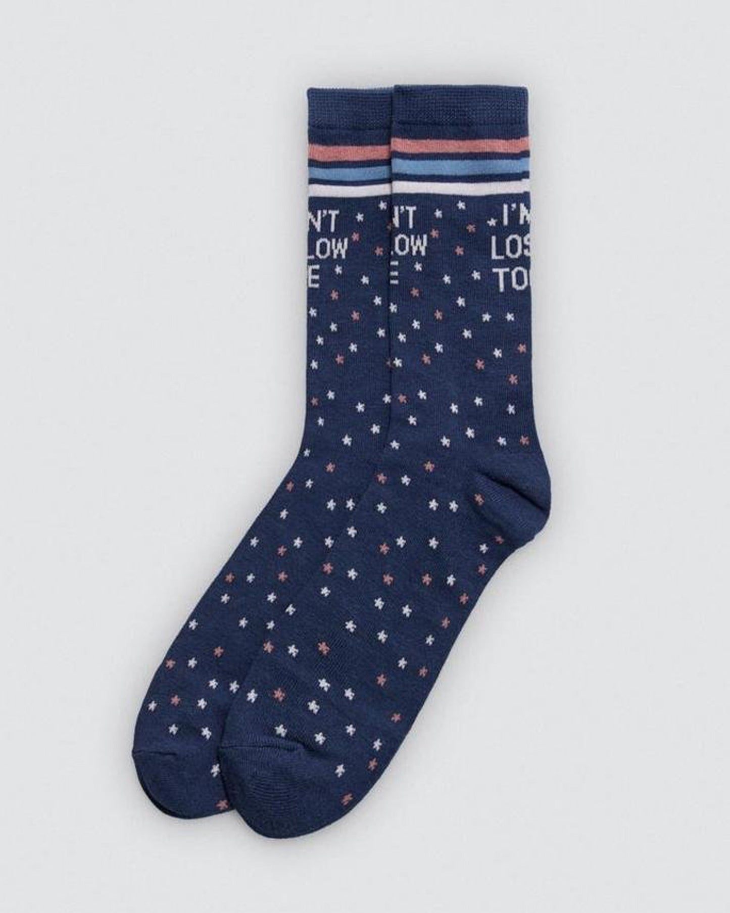 Navy sock with star pattern and text on a light gray background