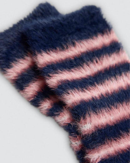 Striped fluffy socks with pink and blue horizontal stripes on a light grey background
