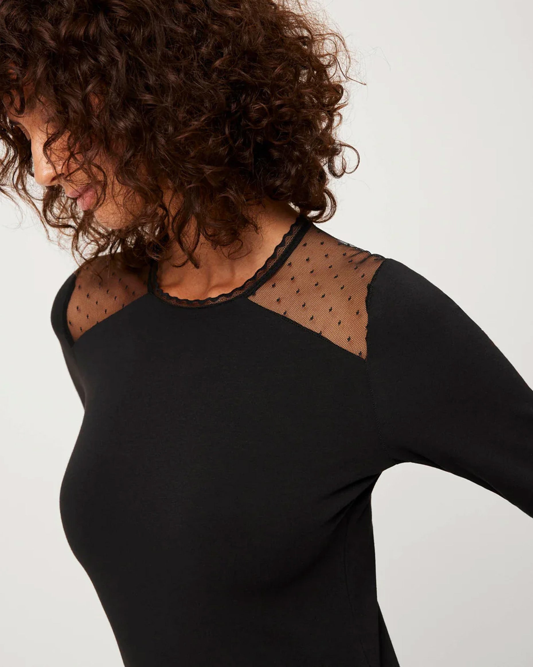 Ysabel Mora 19537 Tulle Shoulder Top - Black soft and light long sleeved cotton top with sheer spot pattern mesh panels on the shoulders and scalloped crew neck trim.