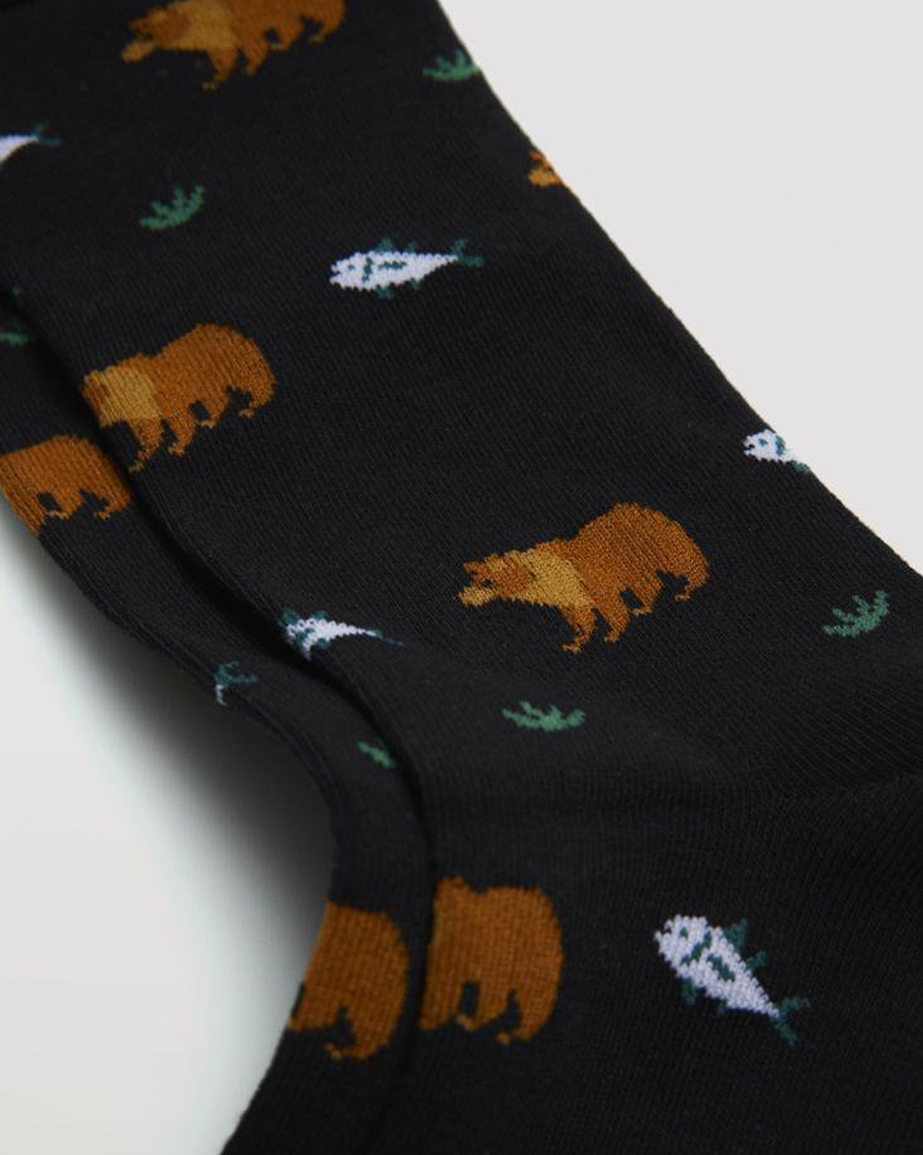 Ysabel Mora 22877 Bear & Fish Socks - Black cotton mix crew length no cuff ankle socks with a brown bear, fish and tuffs of grass pattern.
