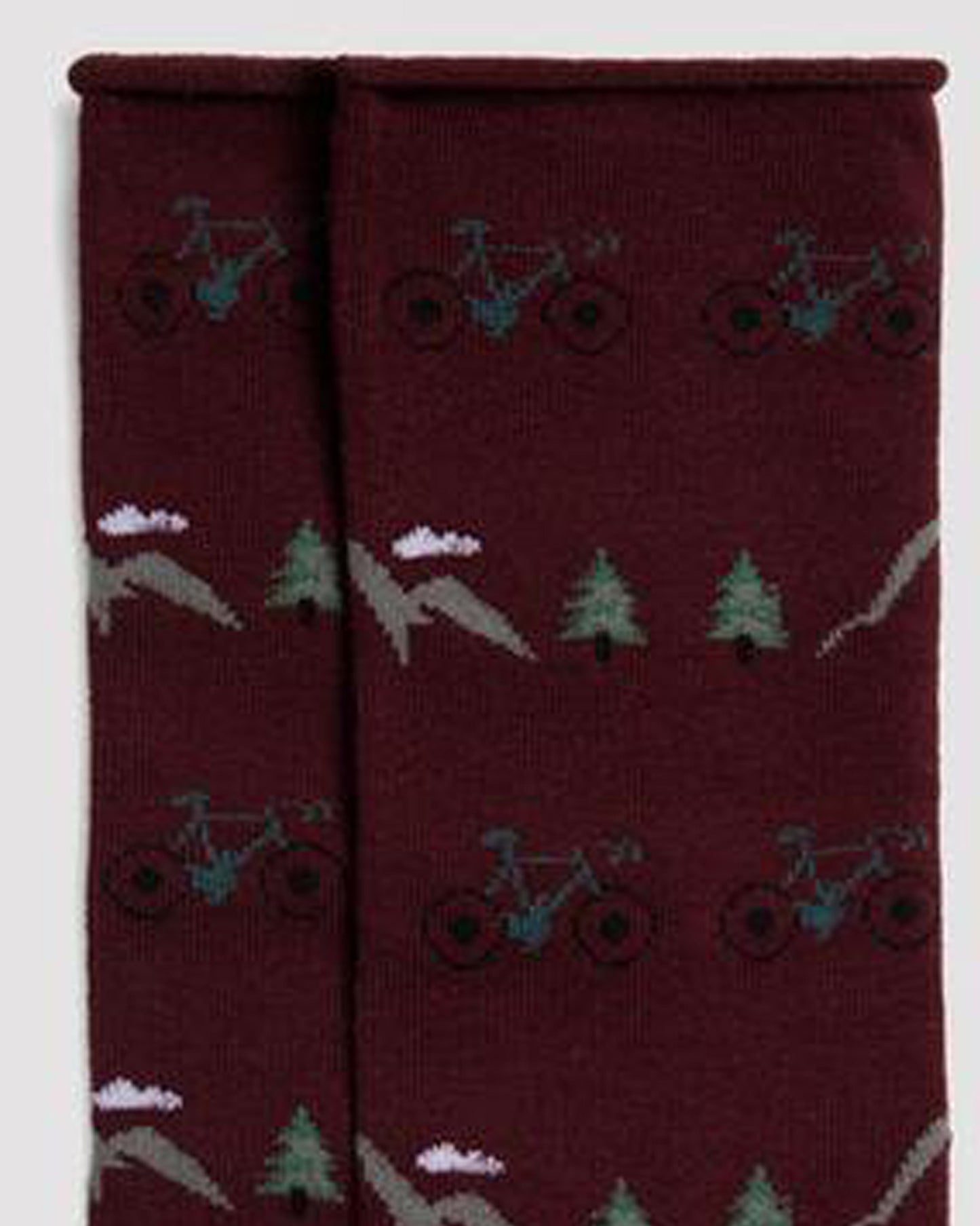 Ysabel Mora 22877 Mountain Bike Sock - Wine cotton mix crew length ankle socks with a mountain bike themed pattern of mountains, trees and bicycles in shades of green, grey and black and a no cuff roll top.
