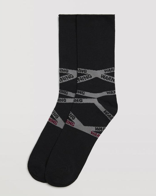 Ysabel Mora 22878 Warning Socks - Black cotton mix crew length ankle socks with grey warning tape style pattern wrapping around the foot.