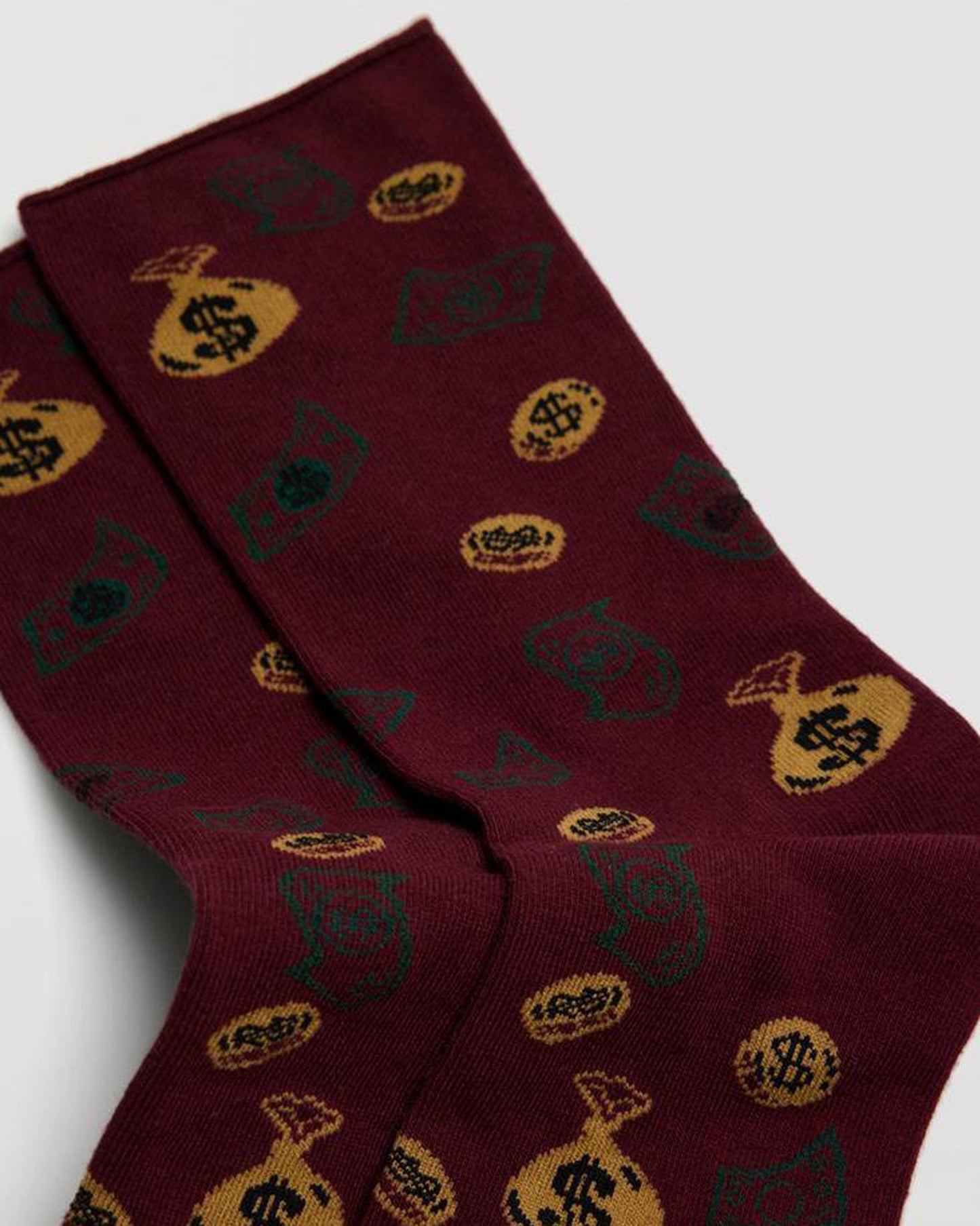 Ysabel Mora 22881 Money Socks - Wine cotton mix crew length ankle socks with a money themed pattern of coins, bags of cash with dollar signs and bank notes.