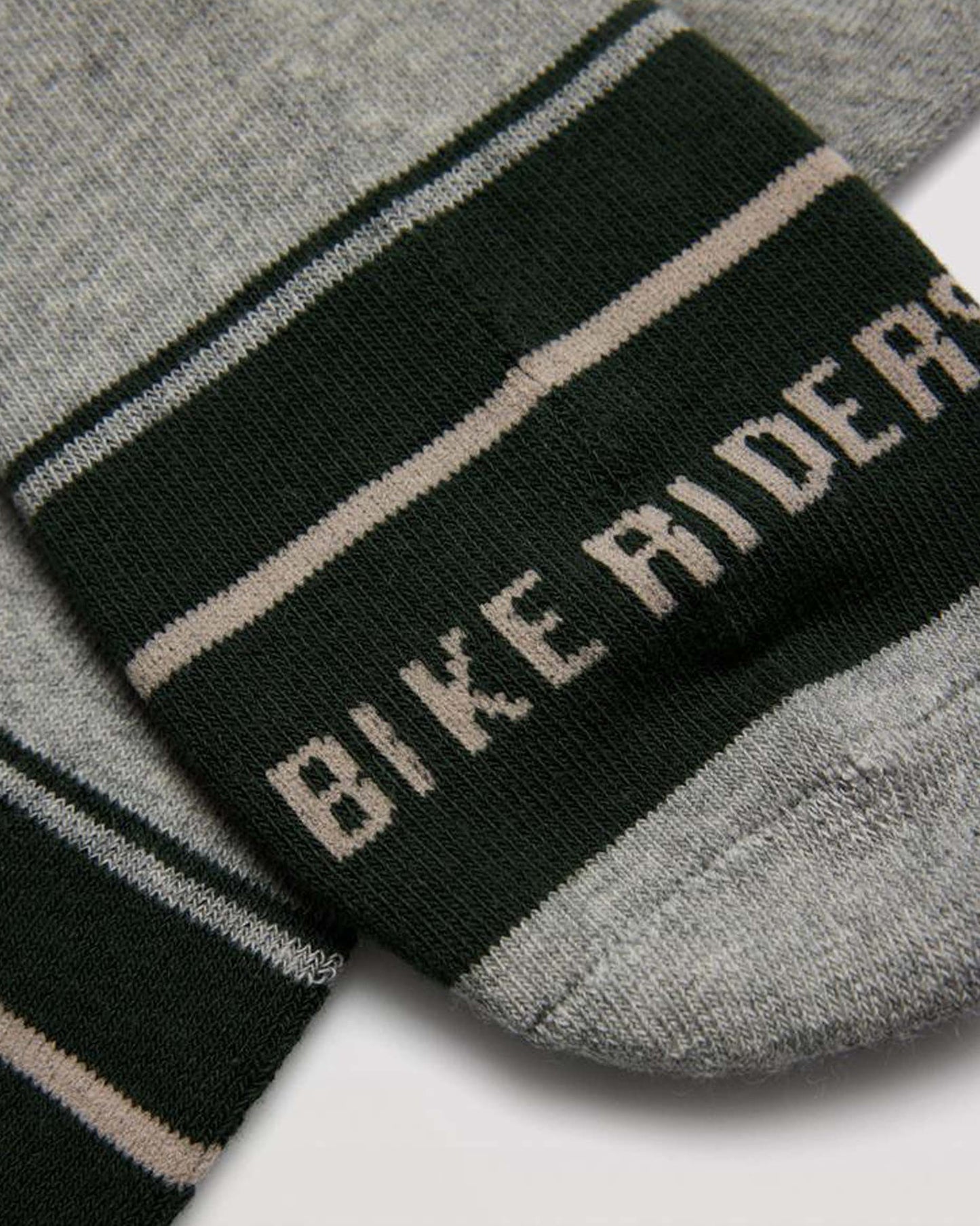 Light grey men's thick and warm terry lined thermal cotton with the text "bike riders club" on the toe.