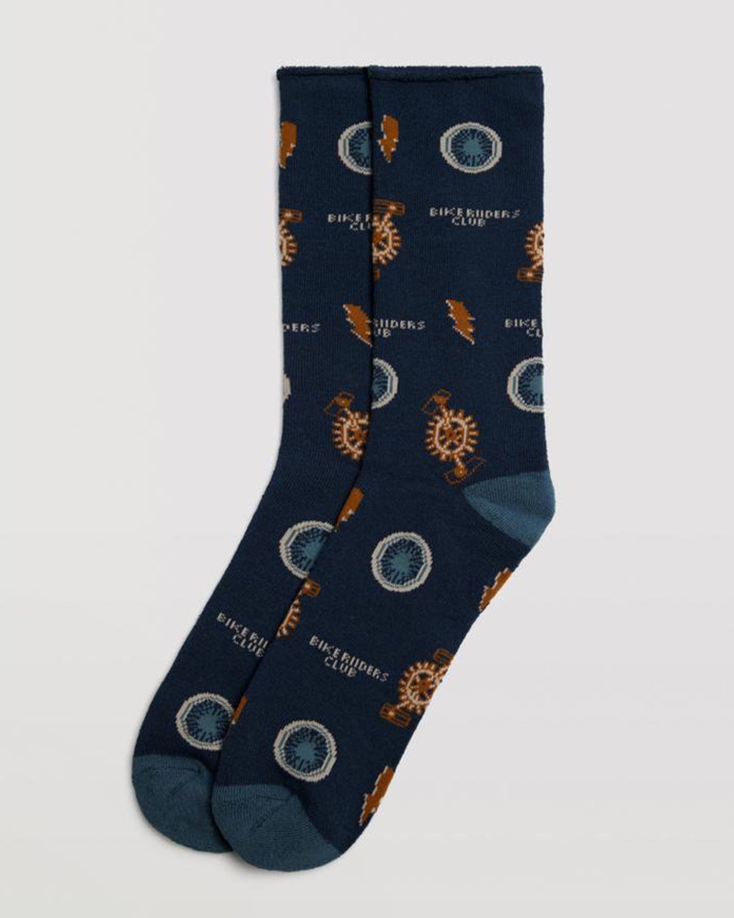 Ysabel Mora 22887 Bike Riders Club Sock - Thick and warm terry lined navy blue cotton crew length no cuff ankle socks with an all over pattern of bicycle parts (wheels and pedals), lightning bolts and the text "bike riders club".