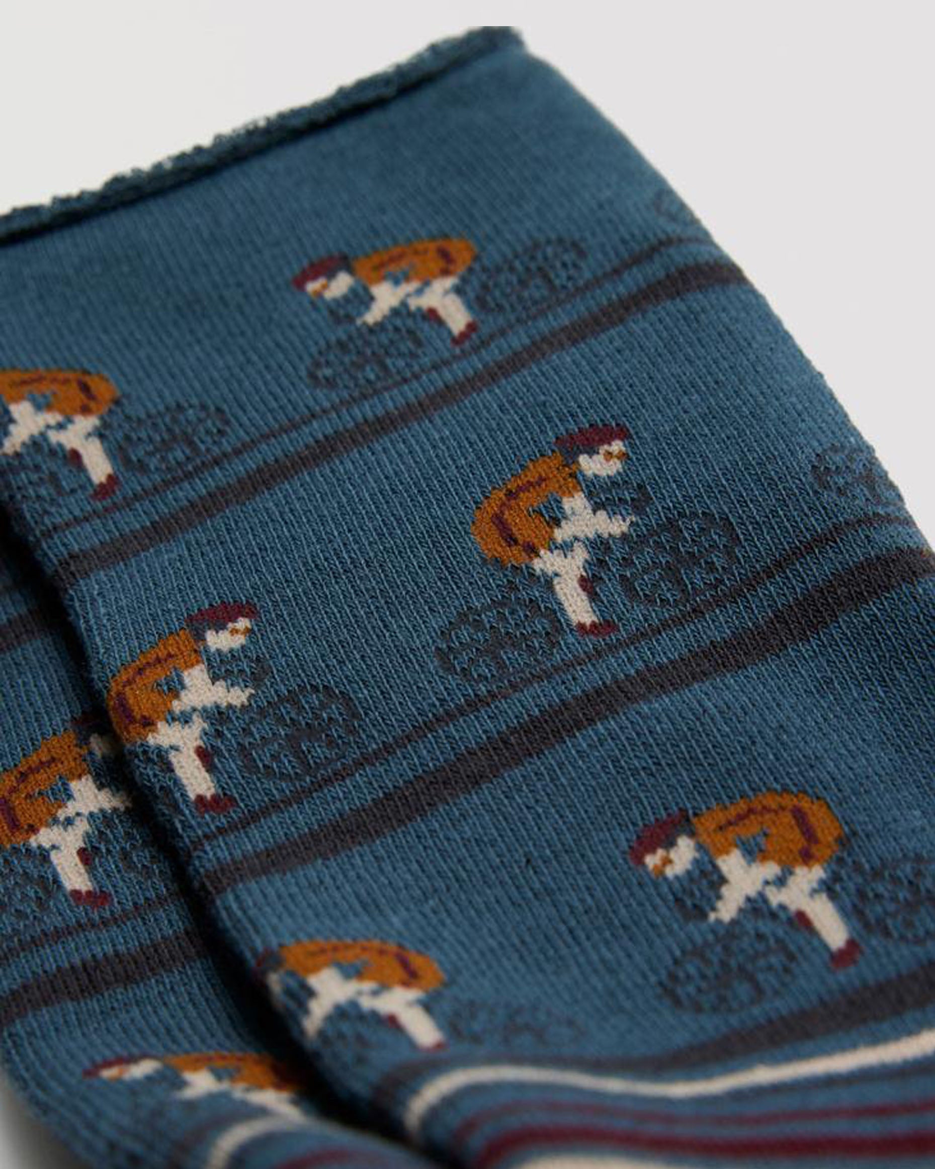Cyclist Themed Socks - Denim blue cotton mix crew length no cuff ankle socks with a warm terry lining, cyclist riding a bike pattern on the top half.