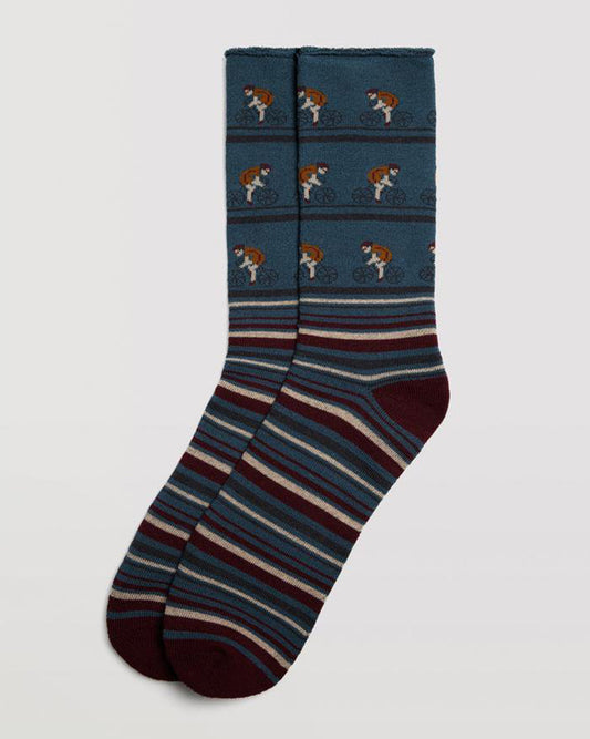 Ysabel Mora 22887 Cyclist Socks - Denim blue cotton mix crew length no cuff ankle socks with a warm terry lining, cyclist riding a bike pattern on the top half and stripes on the bottom.