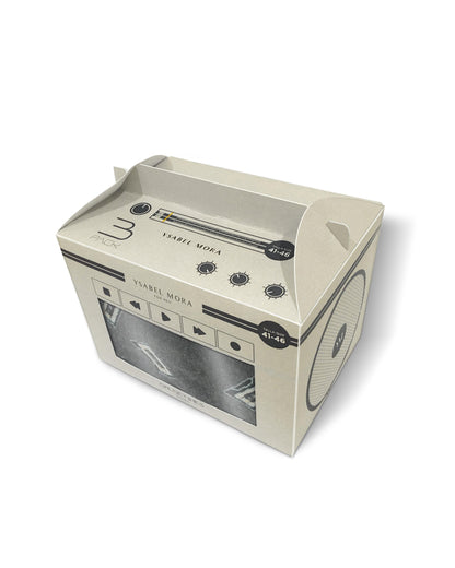 Cassette tape-shaped gift box with a clear window on a white background