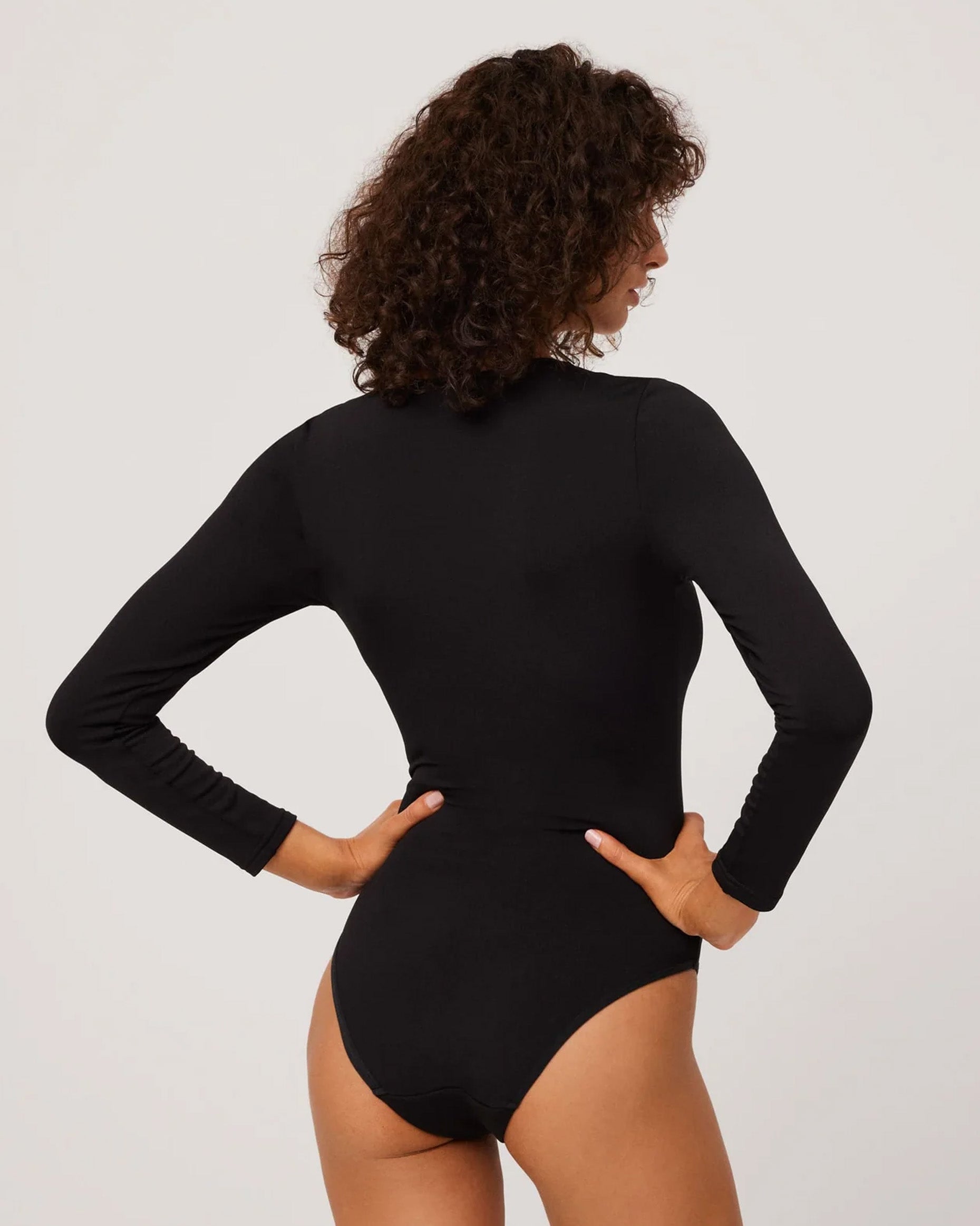 Ysabel Mora 70013 Lace Trim Body-Top - Black soft and warm fleece lined long sleeved body-suit.