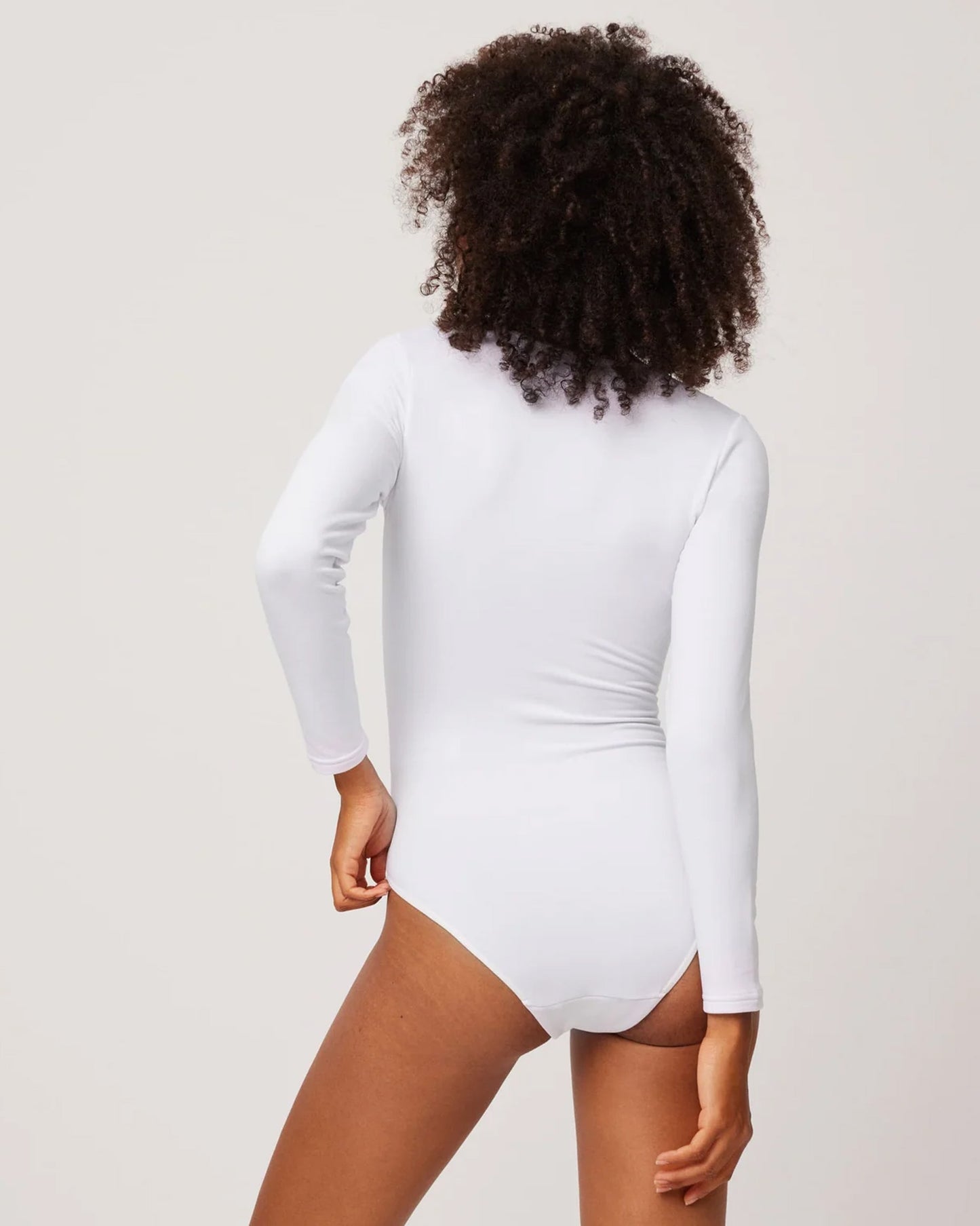 Ysabel Mora 70013 Lace Trim Body-Top - White soft and warm fleece lined long sleeved body-suit.