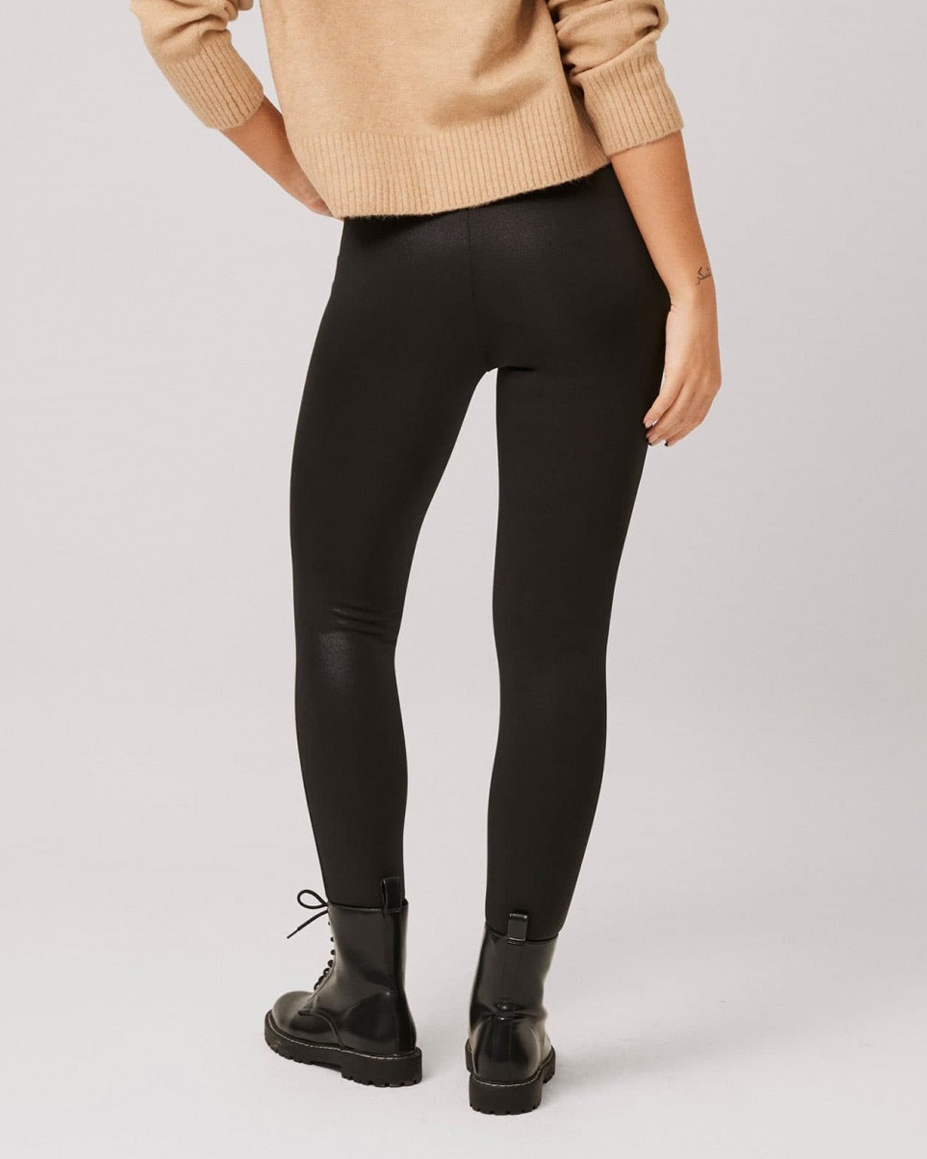 Ysabel Mora 70294 Waxed Thermal Leggings - Black high waisted trouser leggings (treggings) with waxed / faux leather effect coating, warm fleece lining, worn with camel jumper and black patent ankle boots.