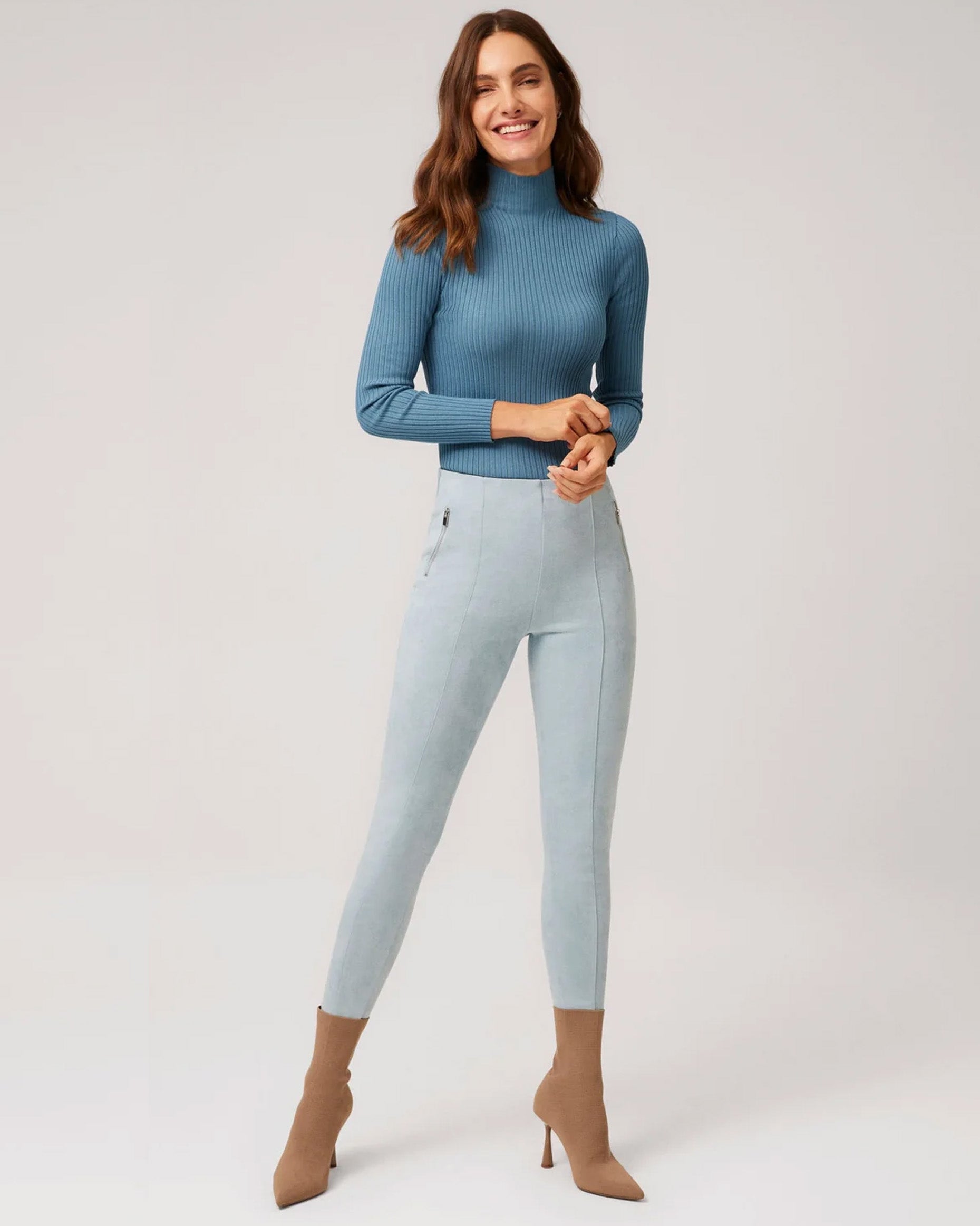 Ysabel Mora 70297 Faux Suede Leggings - Light pastel blue plush velour suede effect high waisted trouser leggings, worn with tan heeled ankle boots and blue turtle neck top.