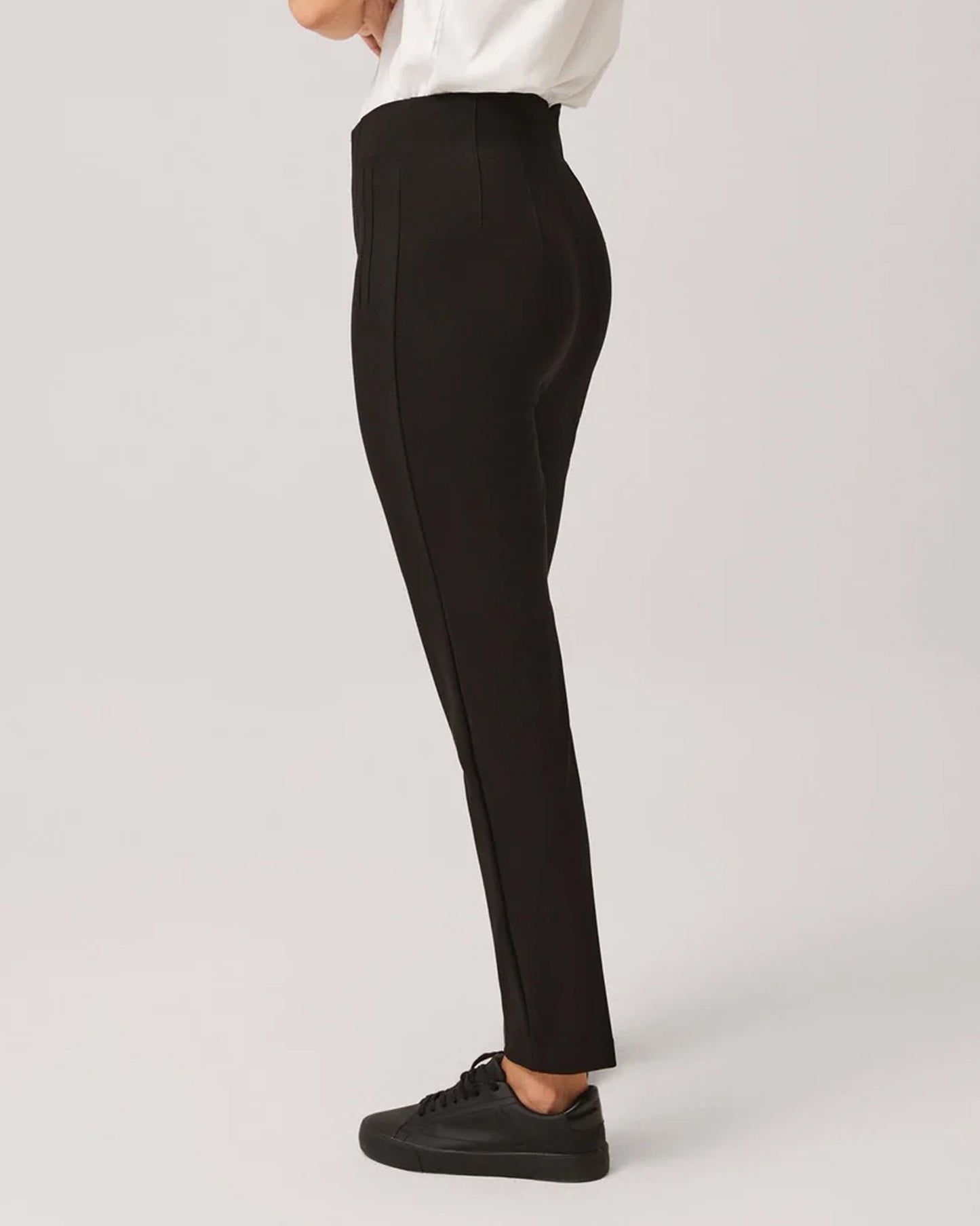 Ysabel Mora 70403 High Waist Trousers - Black suit style high waisted pants with pleated darts, invisible front zipper and button, worn with white t-shirt and black sneakers.