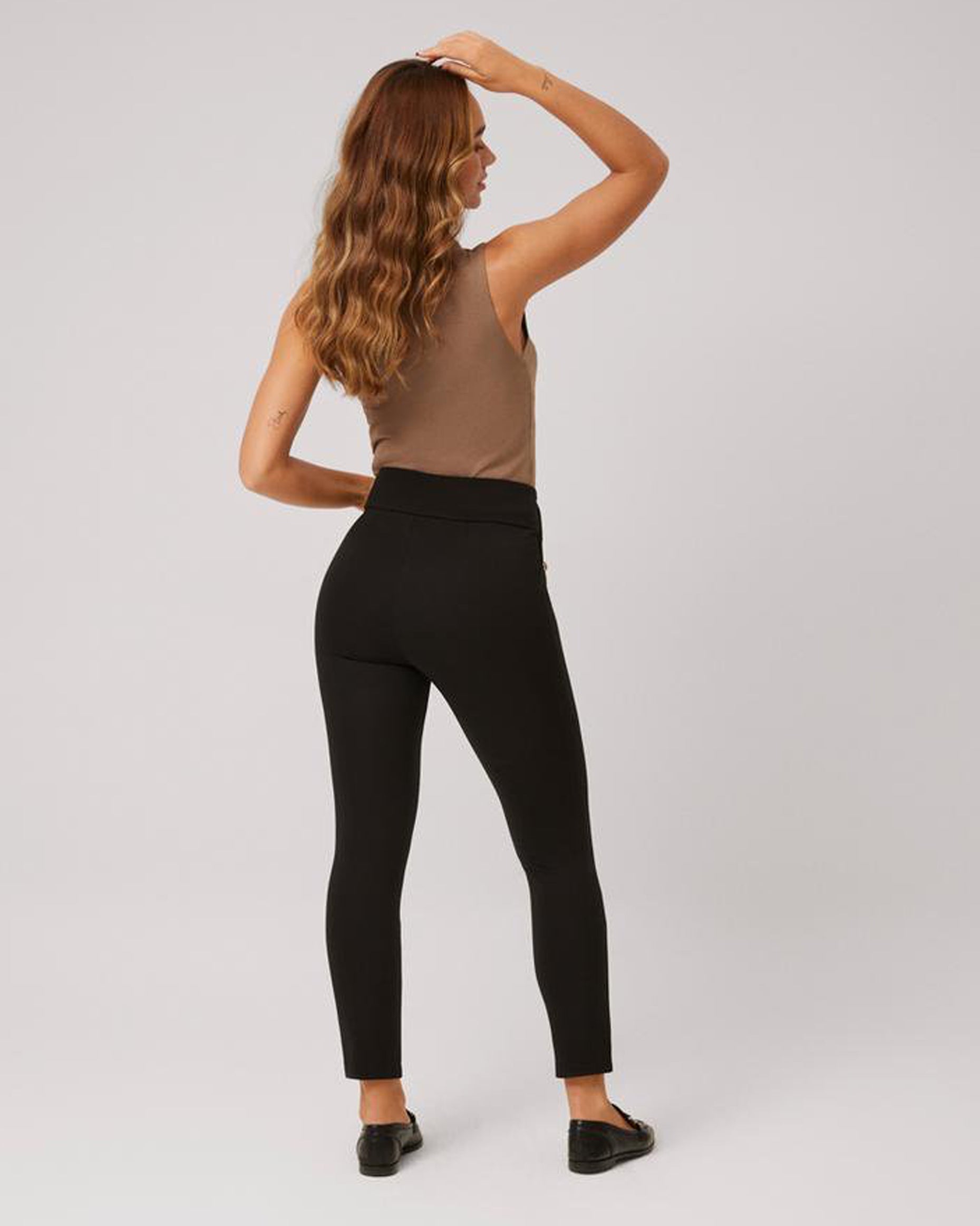 Ysabel Mora 70404 High Rise Button Leggings - Black high waisted suit style trouser leggings with golden buttons on the sides.