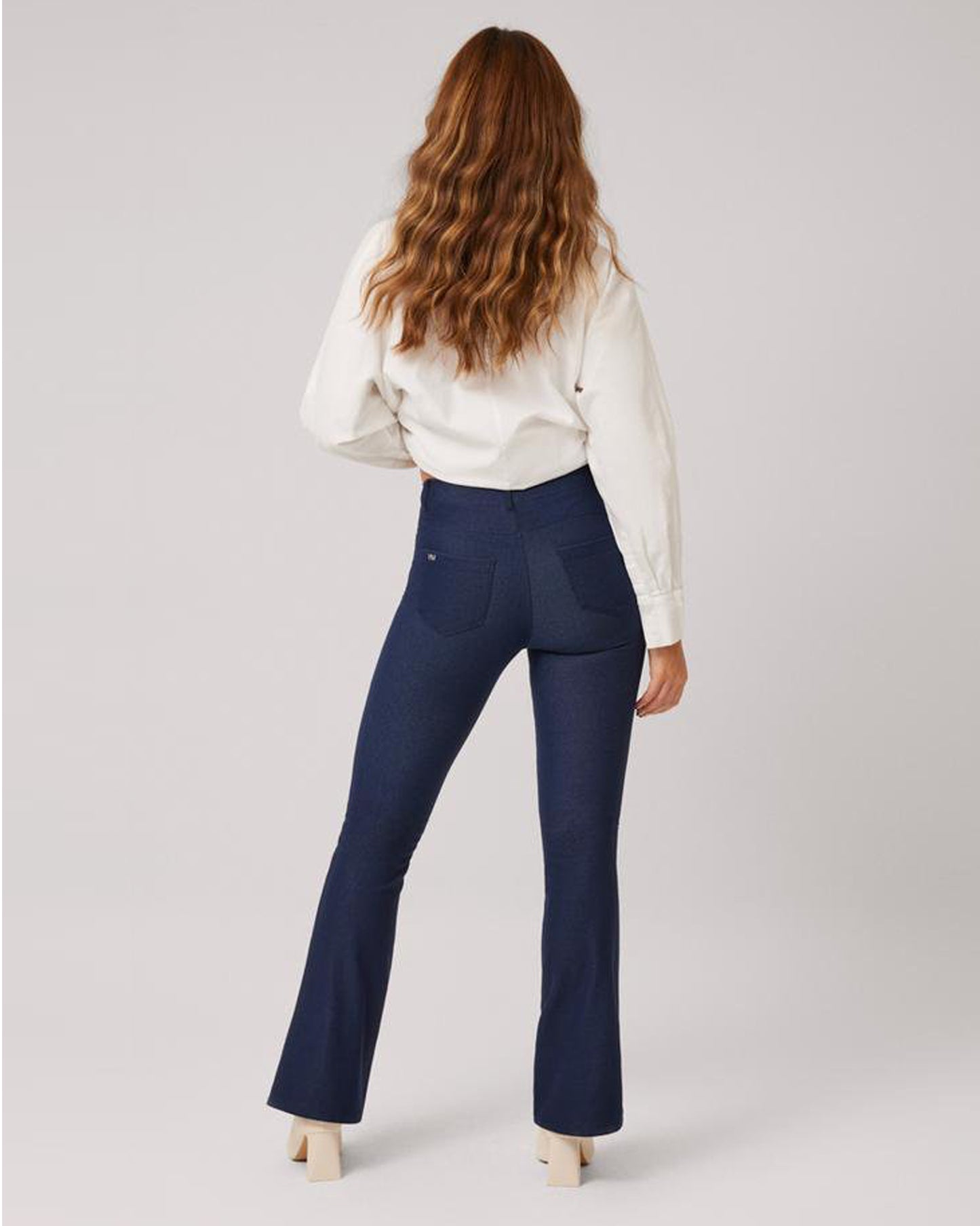 Ysabel Mora 70406 Flared Jeggings - Dark denim blue stretch high rise leggings with a flared boot leg, back pockets, belt loops and faux front pockets and fly top stitching.