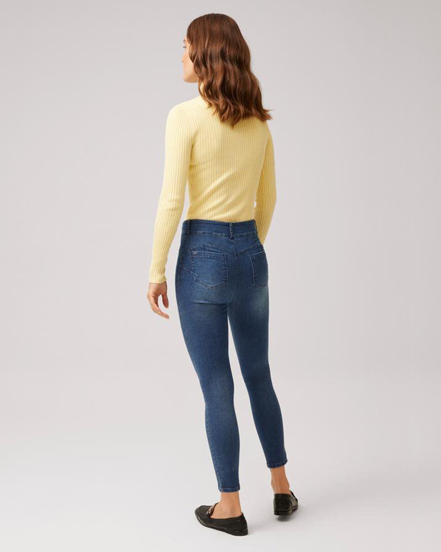 Ysabel Mora 70407 Denim Jeggings - Dark denim stretch jean leggings with faded worn effect, back pockets, belt loops, button and fly zip closures faux front pockets and fly top stitching.