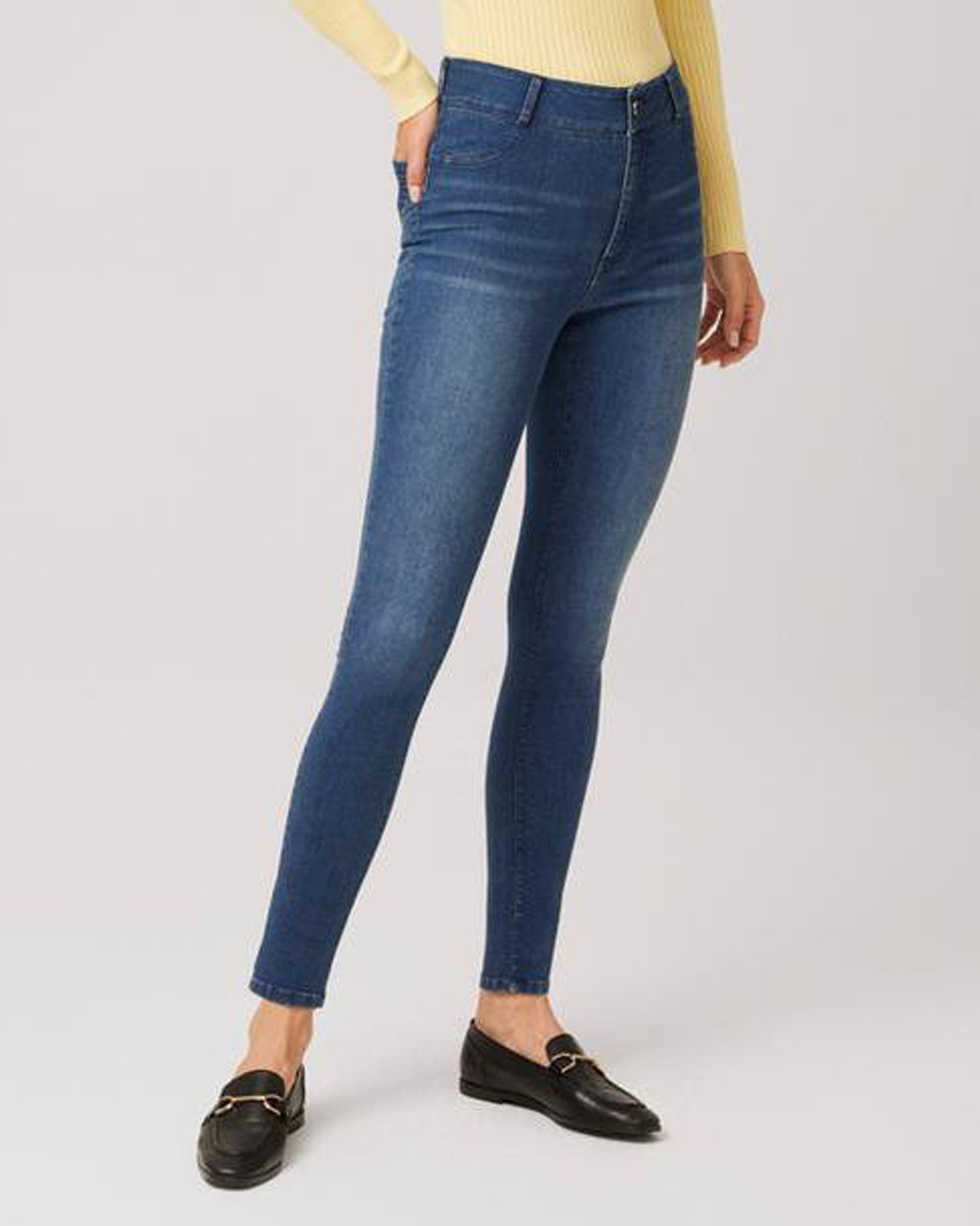 Ysabel Mora 70407 Denim Jeggings - Dark denim stretch jean leggings with faded worn effect, back pockets, belt loops, button and fly zip closures faux front pockets and fly top stitching.