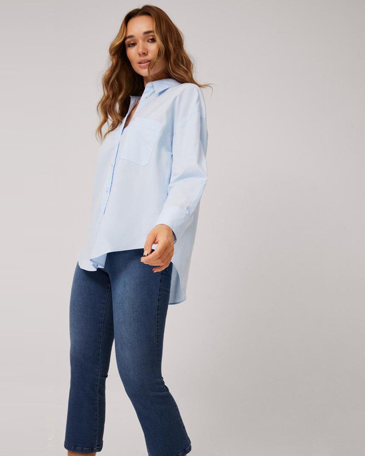 Ysabel Mora 70411 Cropped Flare Jeggings - Dark denim blue stretch high rise leggings with a flared boot leg, back pockets, belt loops and faux front pockets and fly top stitching.