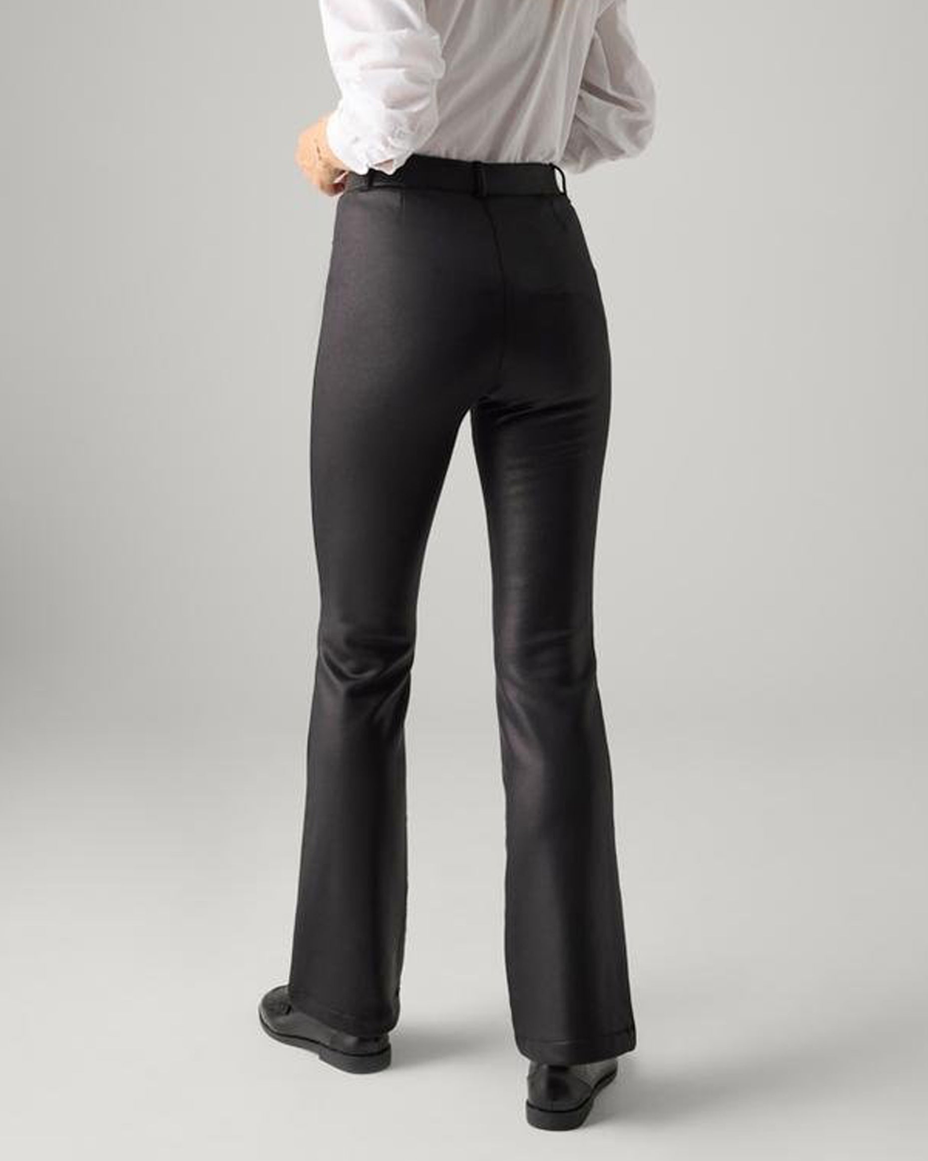 Ysabel Mora 70416 Flared Waxed Thermal Leggings - Black high waisted thermal flared/bootcut trouser leggings with waxed effect print, warm plush fleece lining, belt loops and faux front pocket stitching. Back view.
