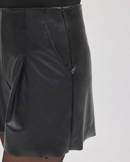 Black leather shorts on a white background