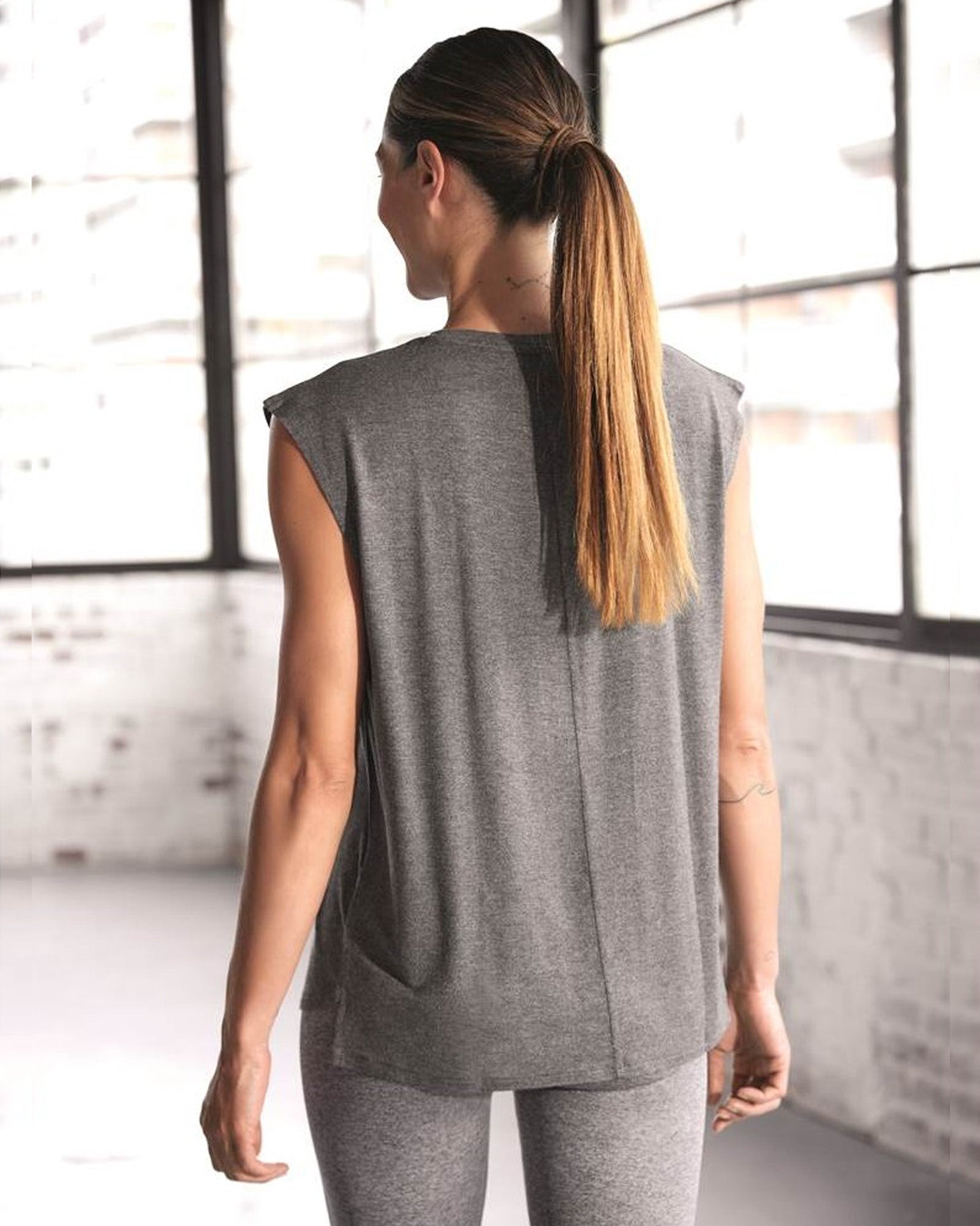 Ysabel Mora 70805 Sports Shirt - Light and airy grey fleck sleeveless sports t-shirt top made of breathable elasticated fabric allowing total freedom of movement. Back view.