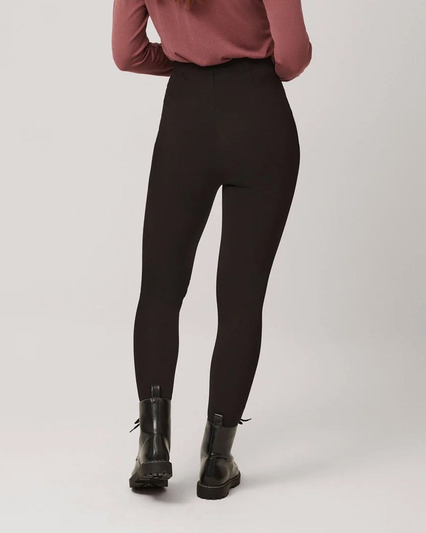 Ysabel Mora 70290 High Rise Treggings - Black high waisted trouser leggings (treggings) with shaped darted waist, worn with dirty pink top and black boots.