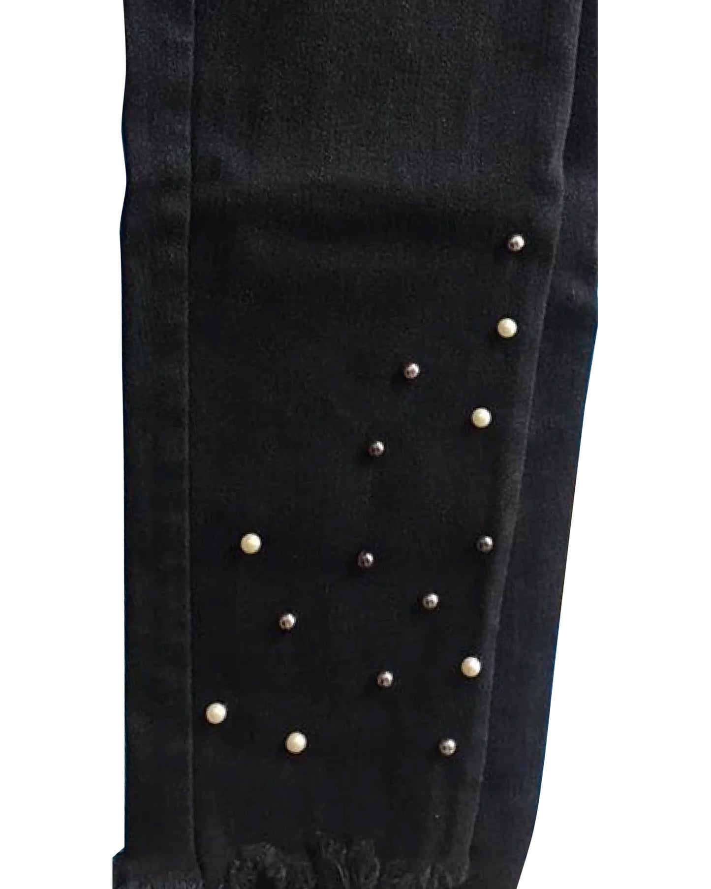 Black pants with pearl embellishments on a white background