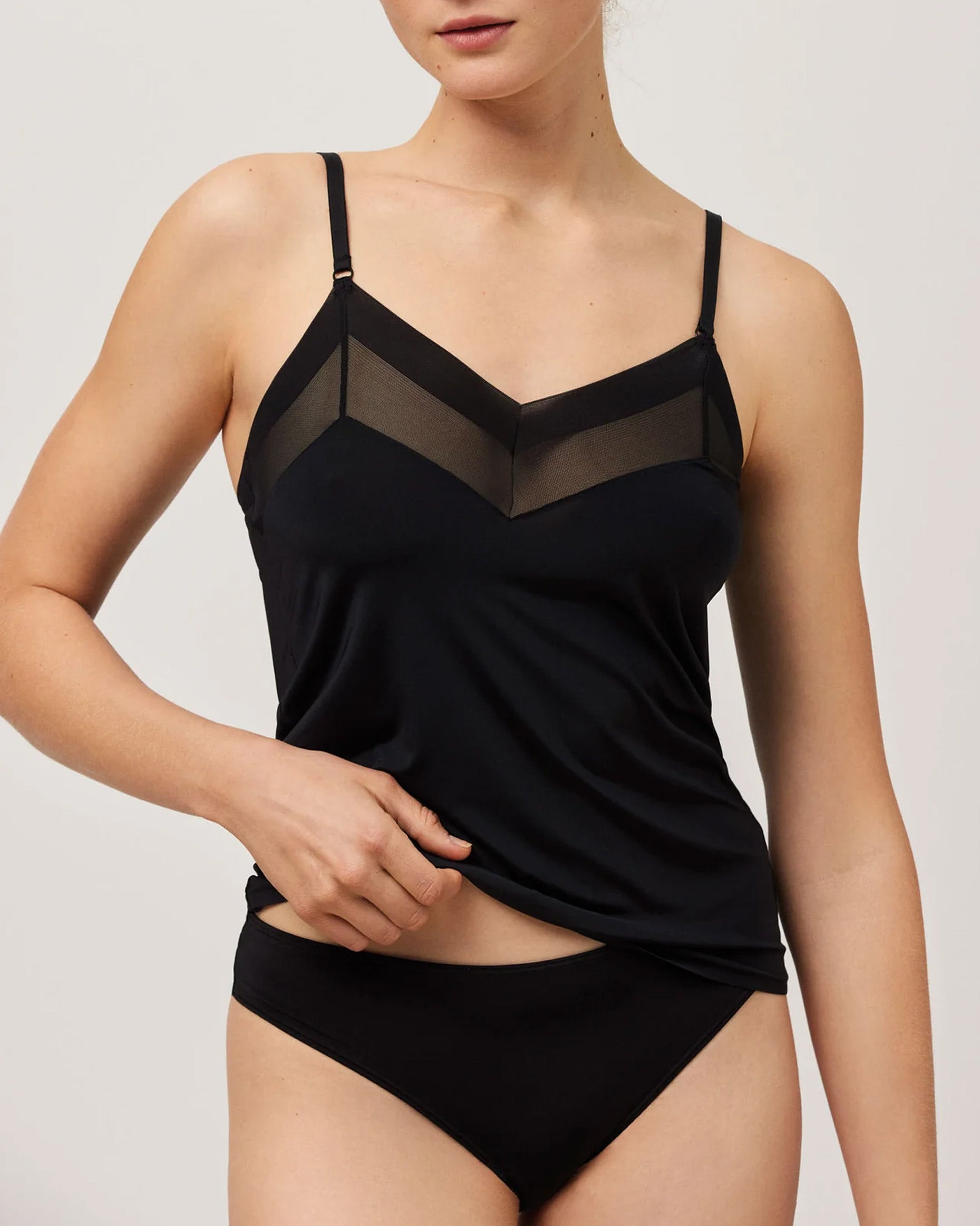 Ysabel Mora 10053 Sheer Panel String Top - Slinky and stretchy black string top with thin adjustable and removable strap top with a transparent mesh v neck panel, perfect for low cut tops and dresses.