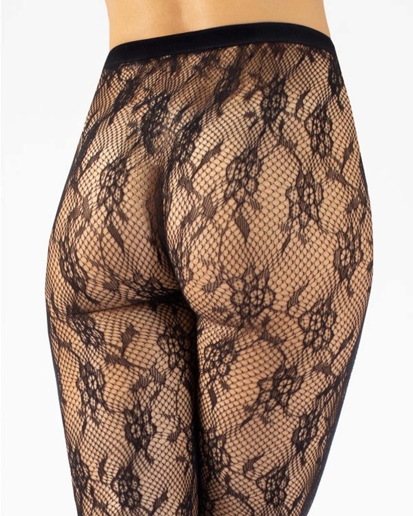 Black floral lace fishnet tights on a white background, back view.