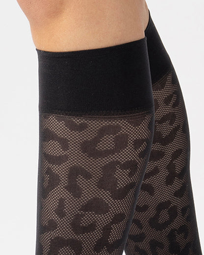 Close-up of a patterned leggings with a plain background