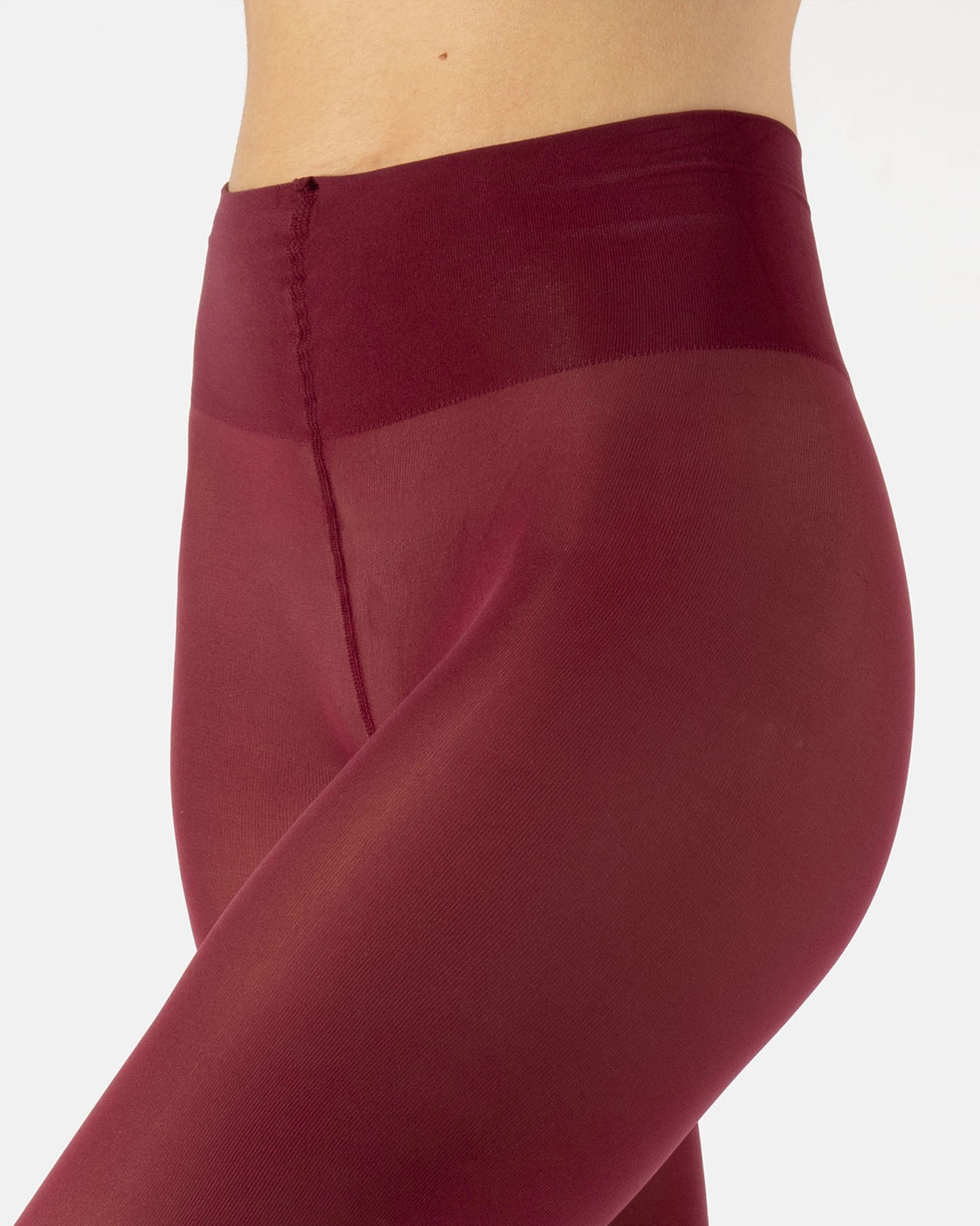 Maroon leggings on a white background