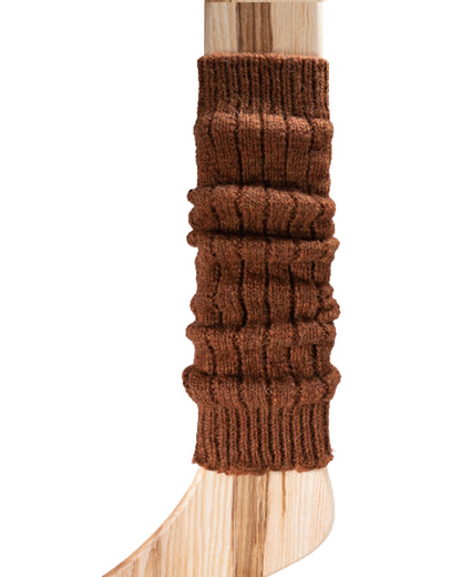 A light brown chunky ribbed knitted leg warmer displayed on a wooden model.