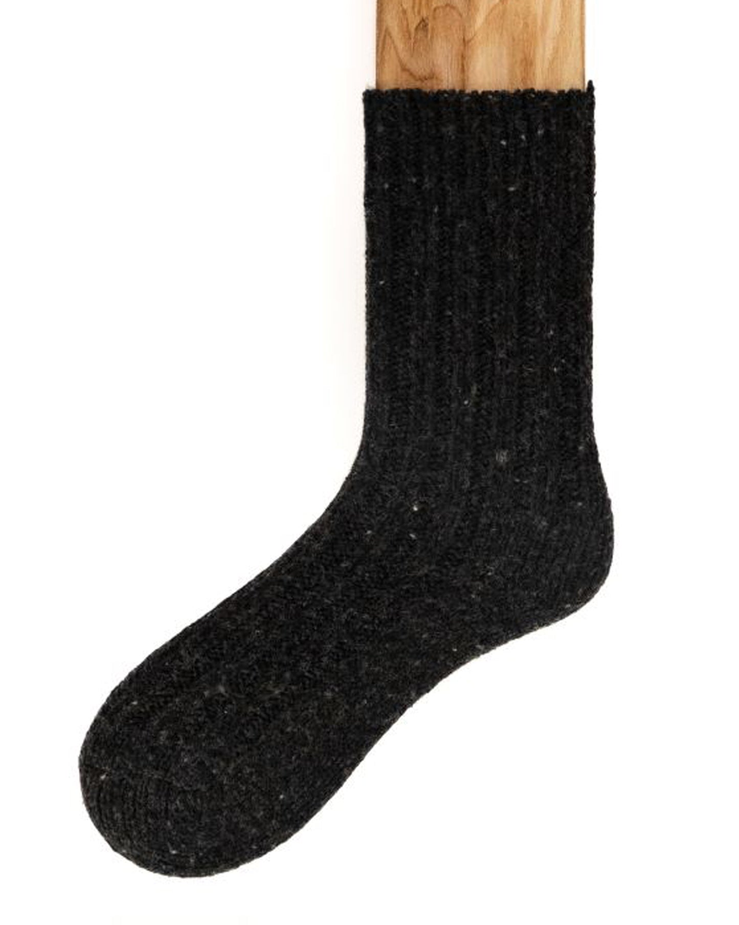Chunky black coloured ribbed knitted wool mix ankle socks with plain sole and a fleck throughout. Made in Ireland by Connemara Socks.