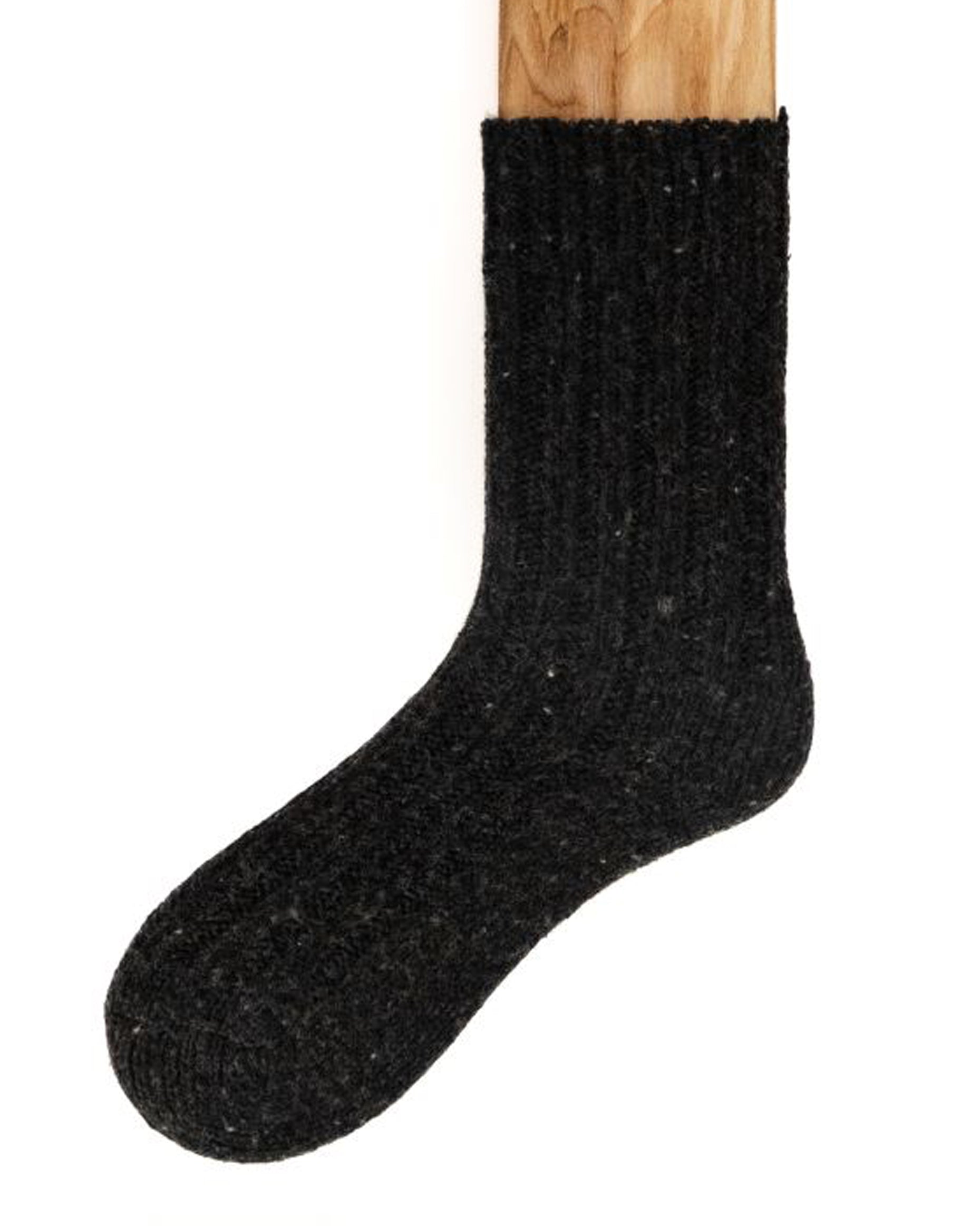 Chunky black coloured ribbed knitted wool mix ankle socks with plain sole and a fleck throughout. Made in Ireland by Connemara Socks.