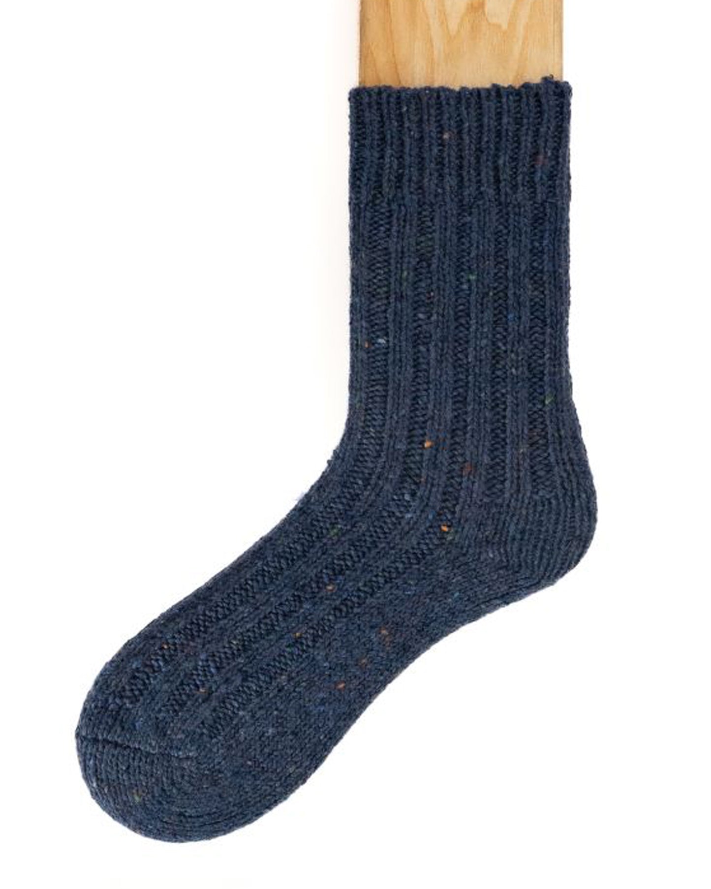 Chunky light navy denim blue coloured ribbed knitted wool mix ankle socks with plain sole and a fleck throughout. Made in Ireland by Connemara Socks.