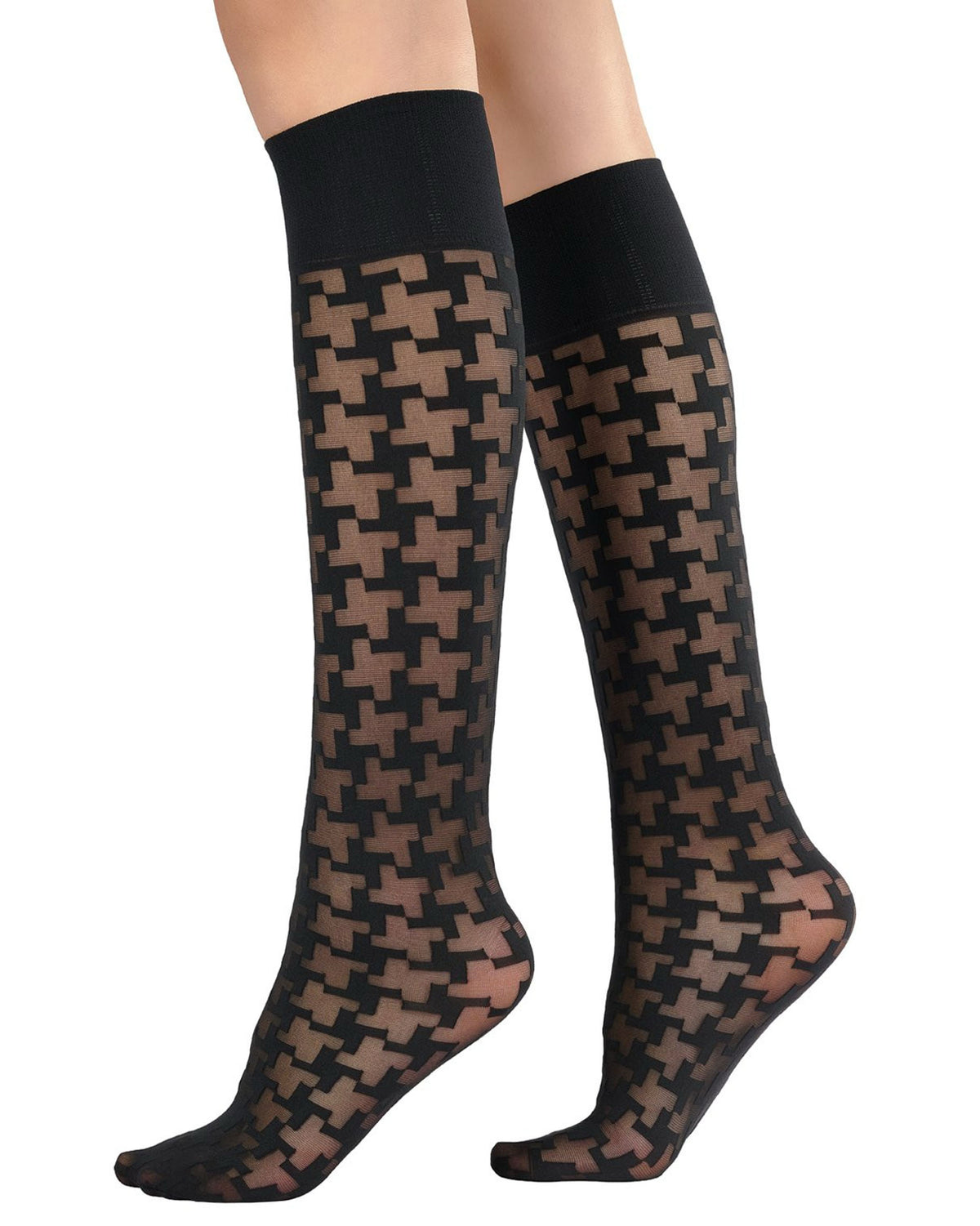 knee socks with a black geometric houndstooth pattern, shown on a model's legs against a white background.