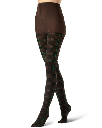 A model's legs wearing brown tights with a green and black tartan plaid pattern, shown from the waist down on a white background.