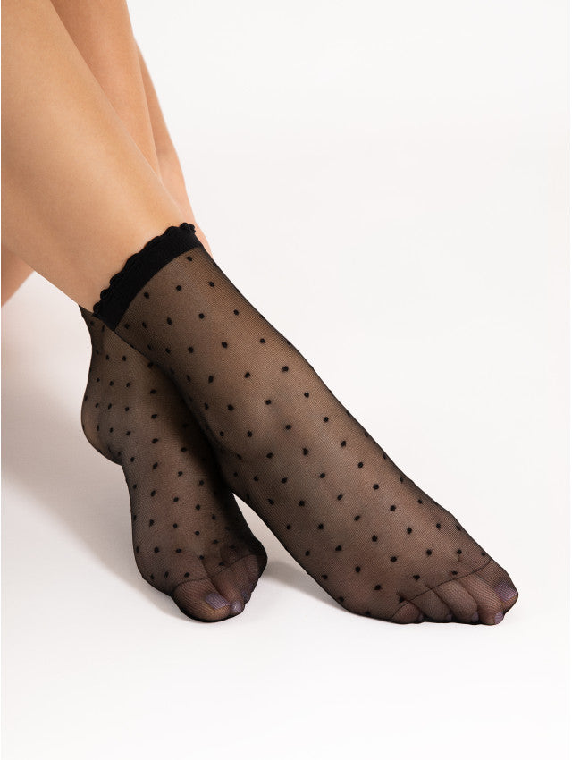 Fiore Bella Socks - Sheer black fashion ankle socks with an all over spot pattern and scalloped edged cuff.