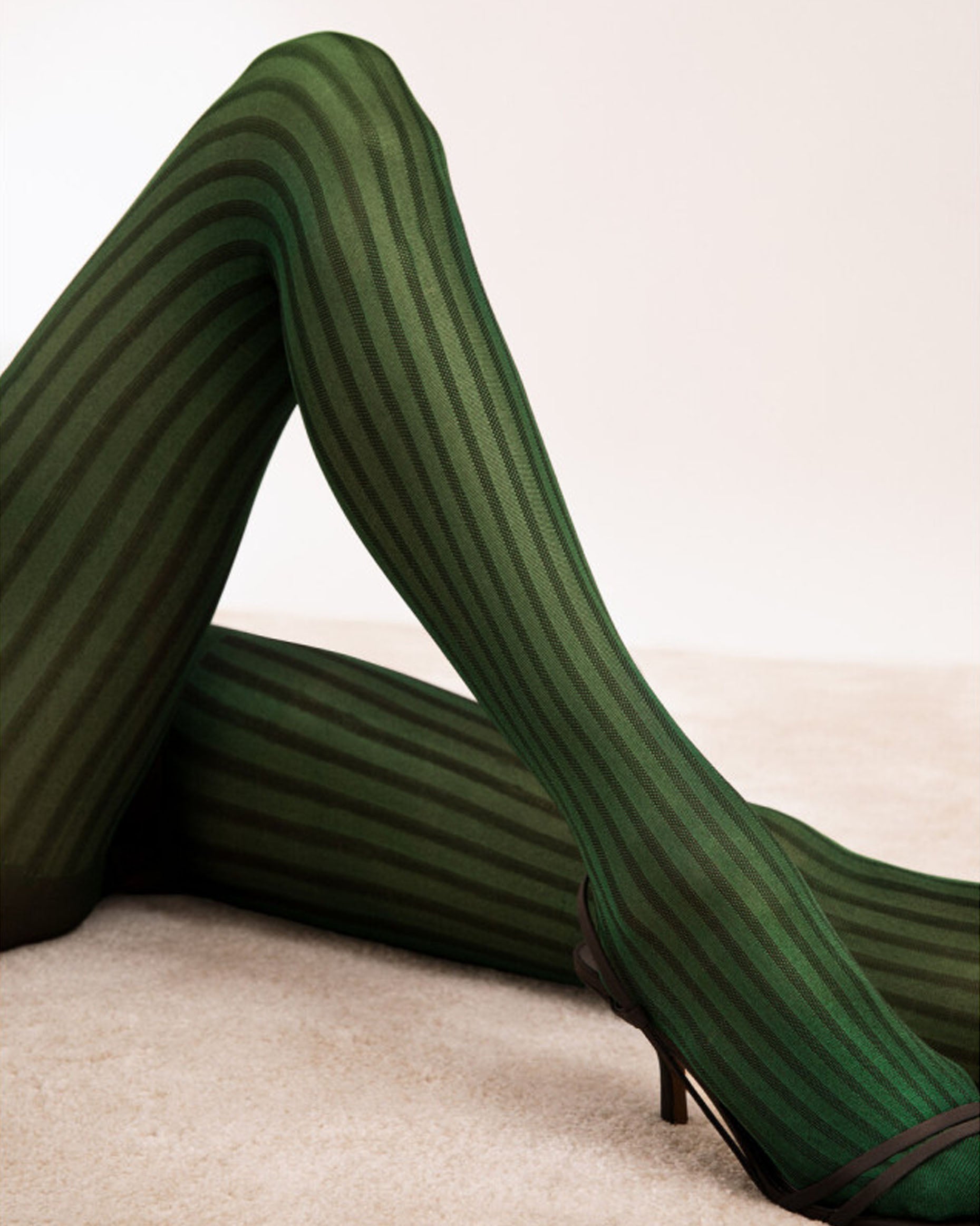 Fiore Colour Story Tights - Semi-opaque bottle green fashion tights with a two toned vertical stripe and gloss shine finish.