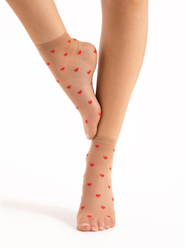 Fiore Crush - Sheer nude fashion ankle socks with an all over red woven heart pattern in and plain cuff.