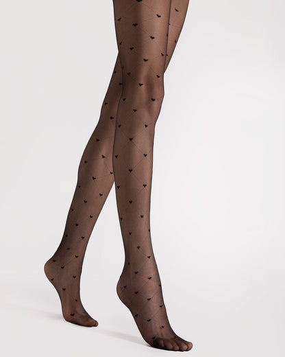 Fiore Cuori 20 Den - Sheer black fashion tights with a wide diamond pattern with hearts. Side view.