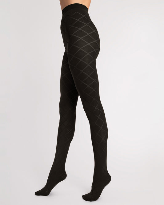 Black tights with diamond pattern worn by a person on a white background