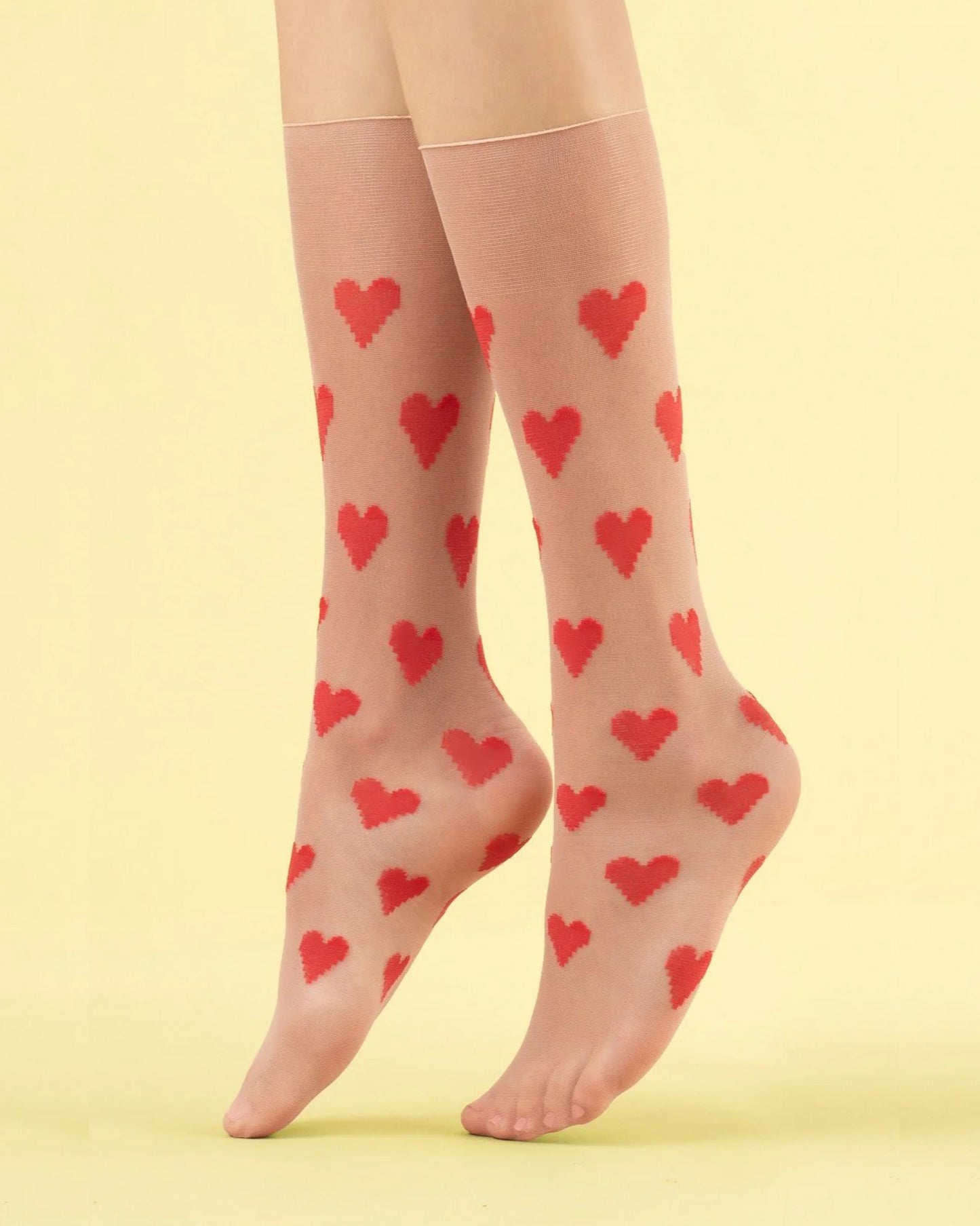 Fiore Love Me Sock - Sheer nude fashion knee-high socks with woven red heart pattern and deep comfort.