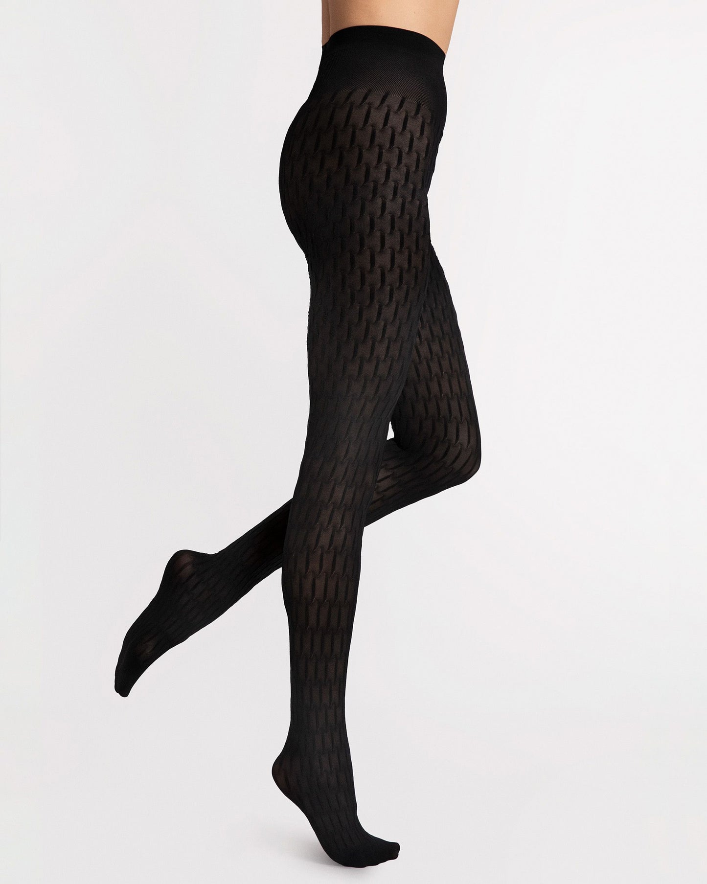 Black textured patterned tights on a white background