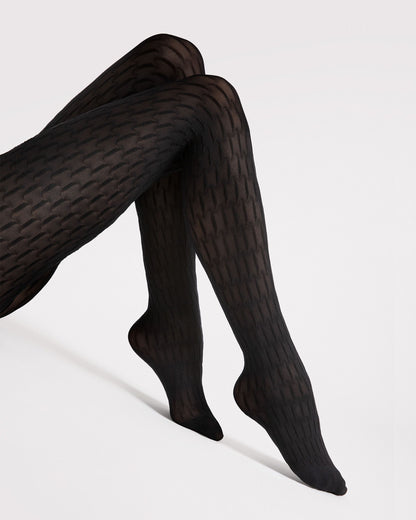 Black textured patterned tights on a white background